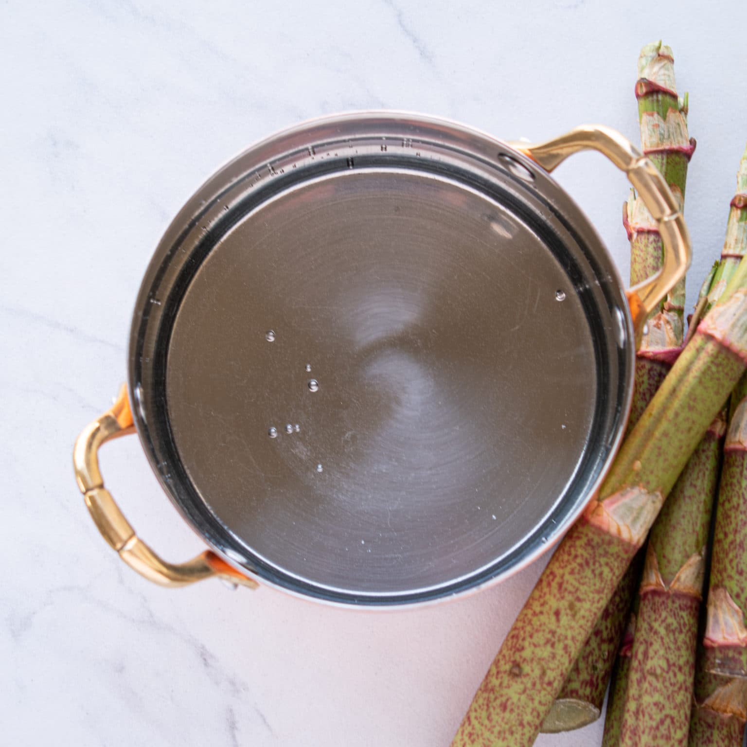 Boil water and sugar to make a syrup