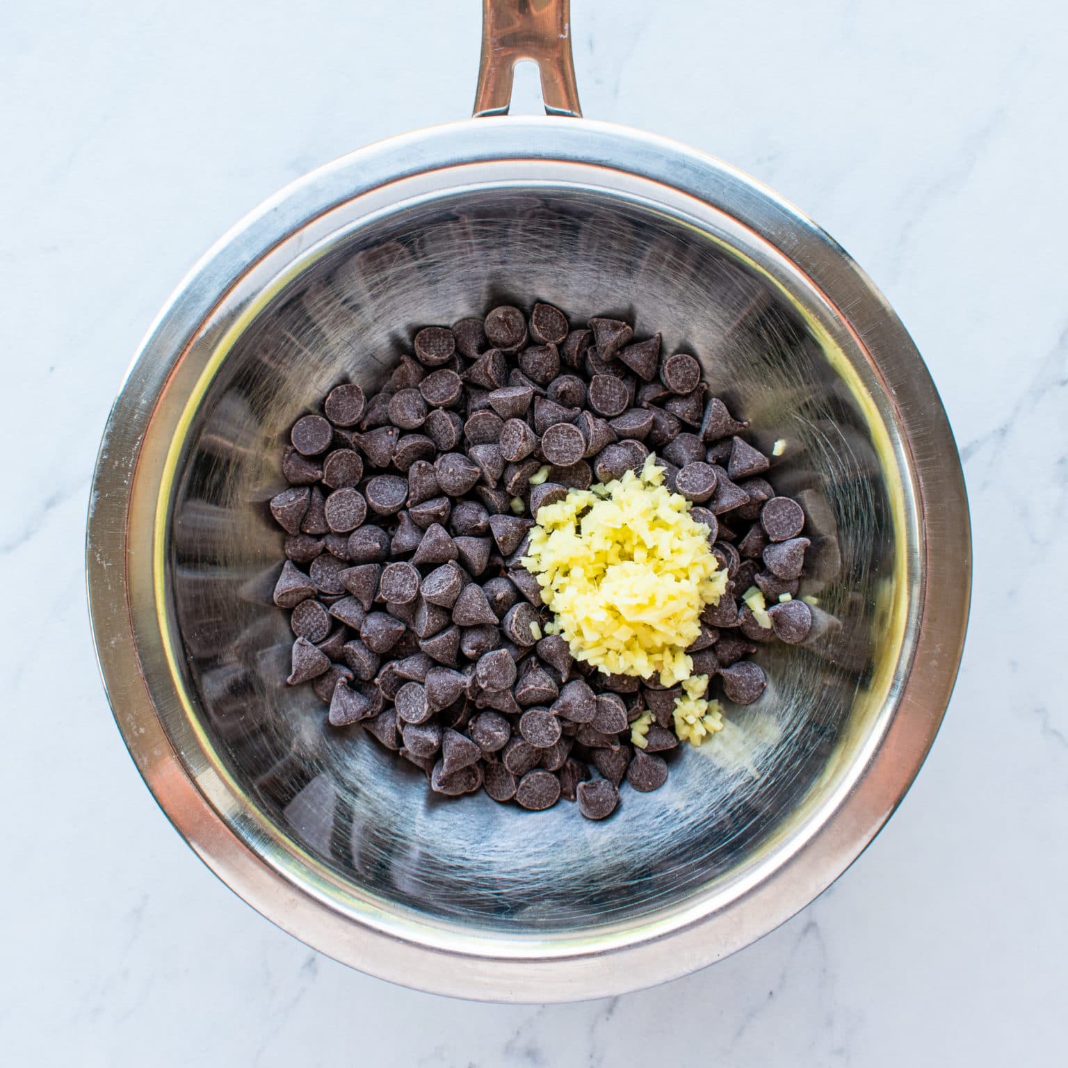 Melt chocolate and ginger